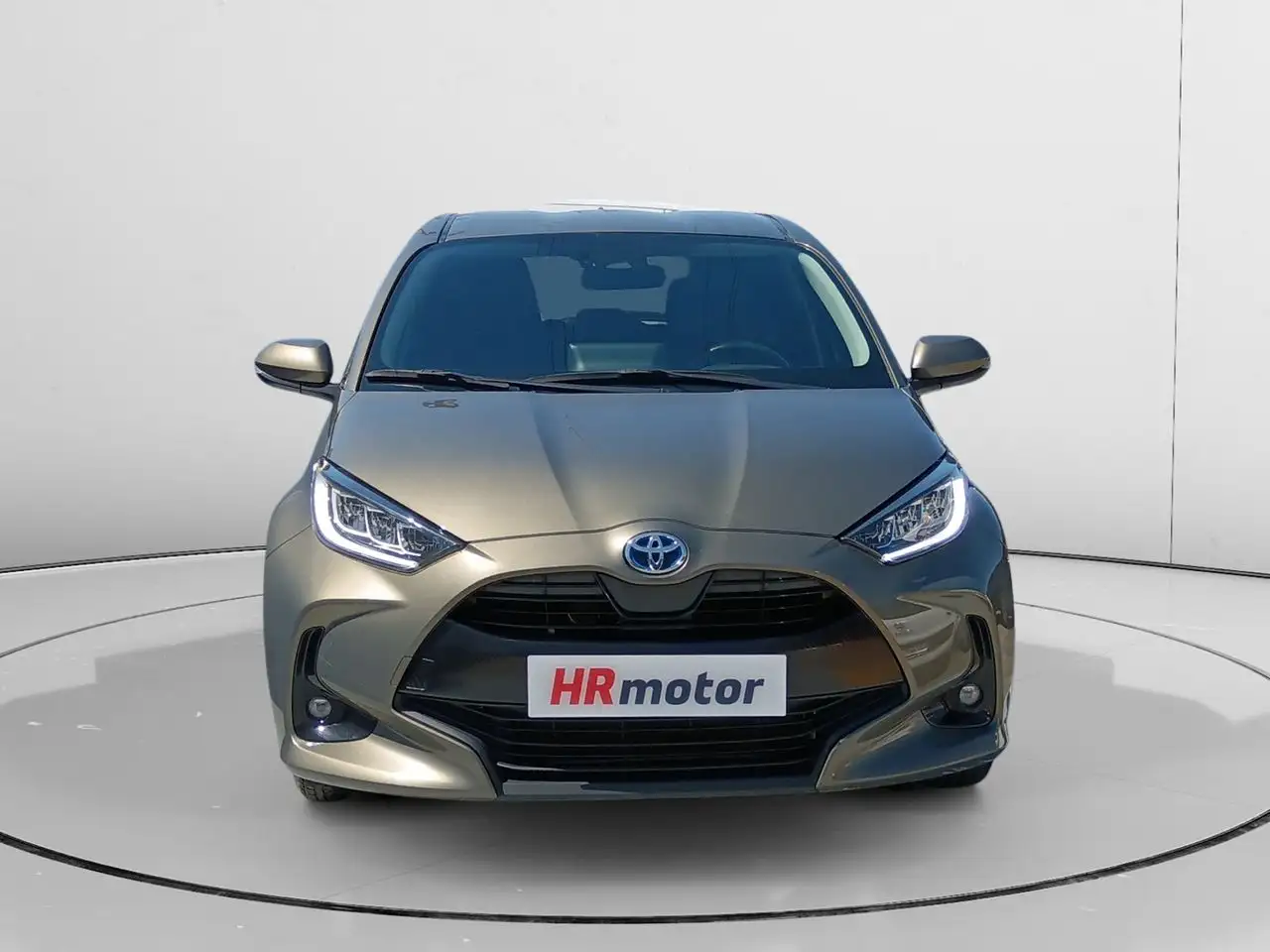 Renting Toyota Yaris Hybrid Design Beige