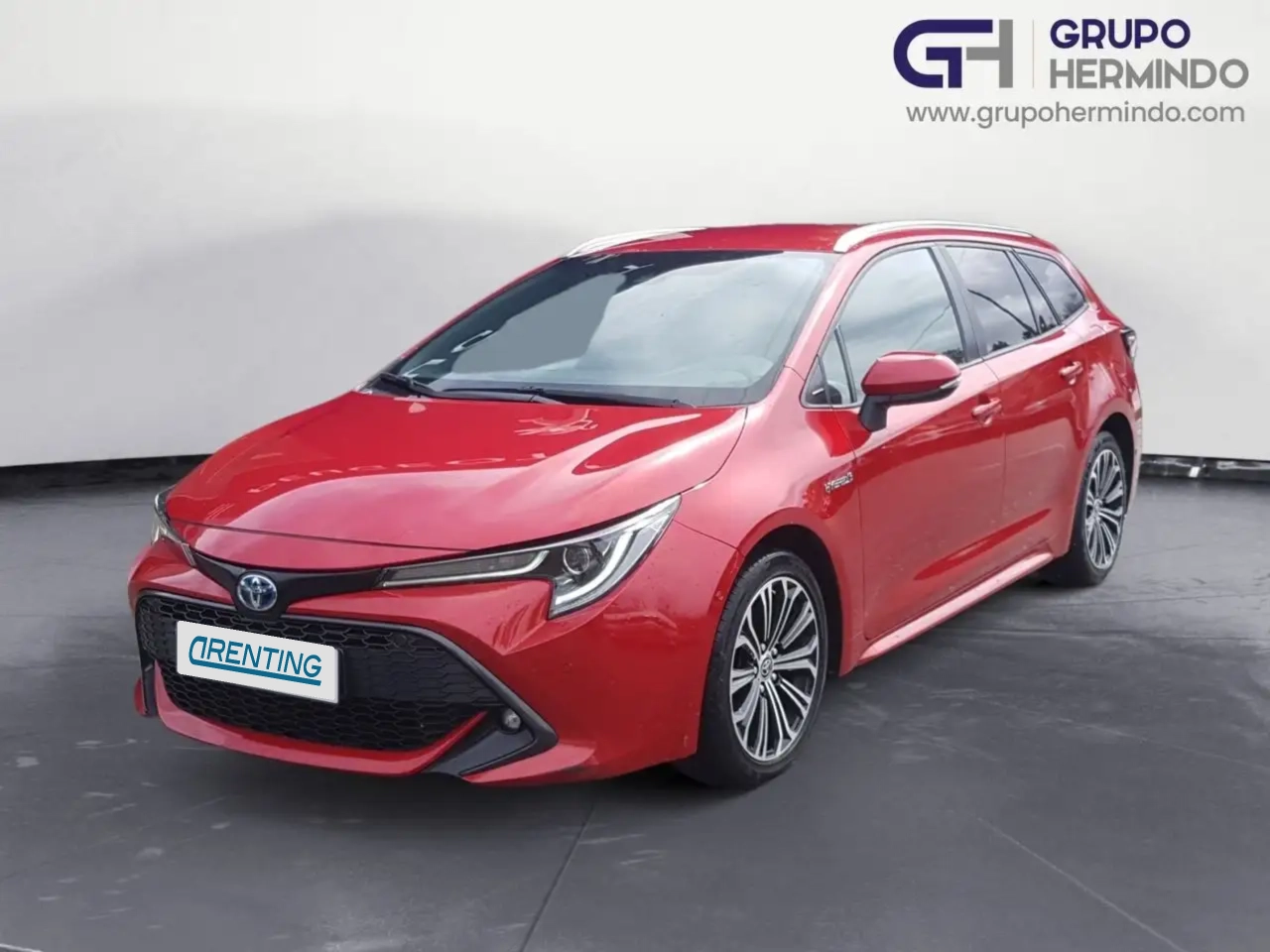 Renting Toyota Corolla 2.0 180H STYLE ECVT TOURING SPORT Rojo