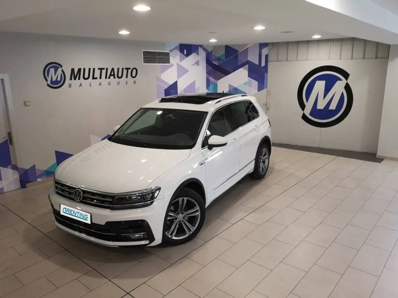 Renting Volkswagen Tiguan 2.0TDI Sport DSG 110kW Blanco 1