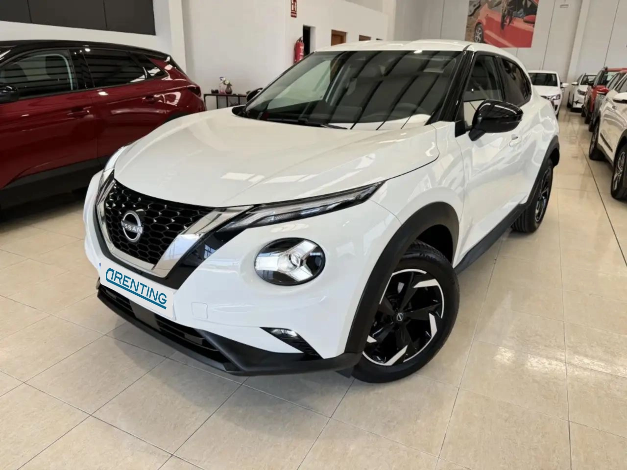 Renting Nissan Juke 1.0 DIG-T Acenta 4×2 114 Blanco 3